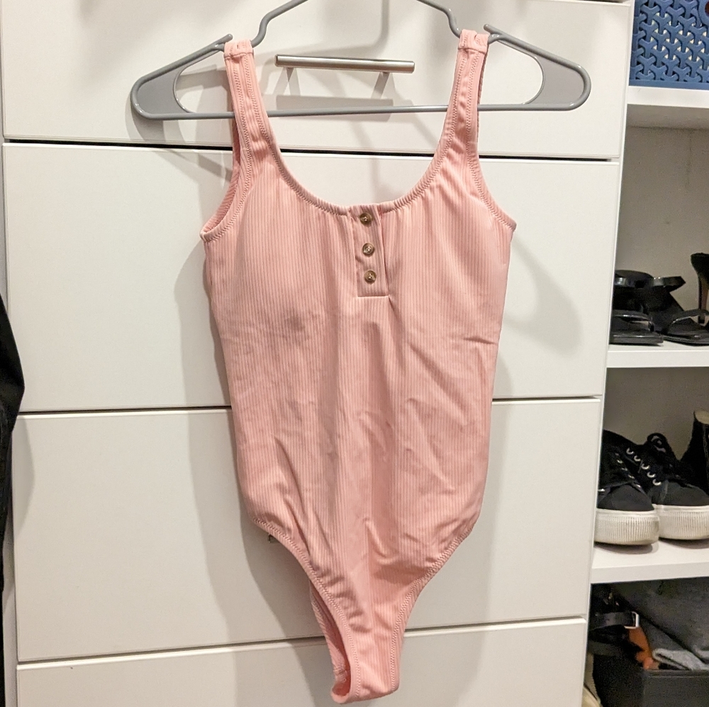 Pink one piece bathing suit
